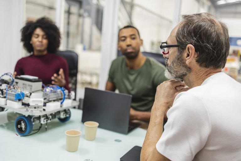engineers developing innovative robotics solutions XLZJYK7