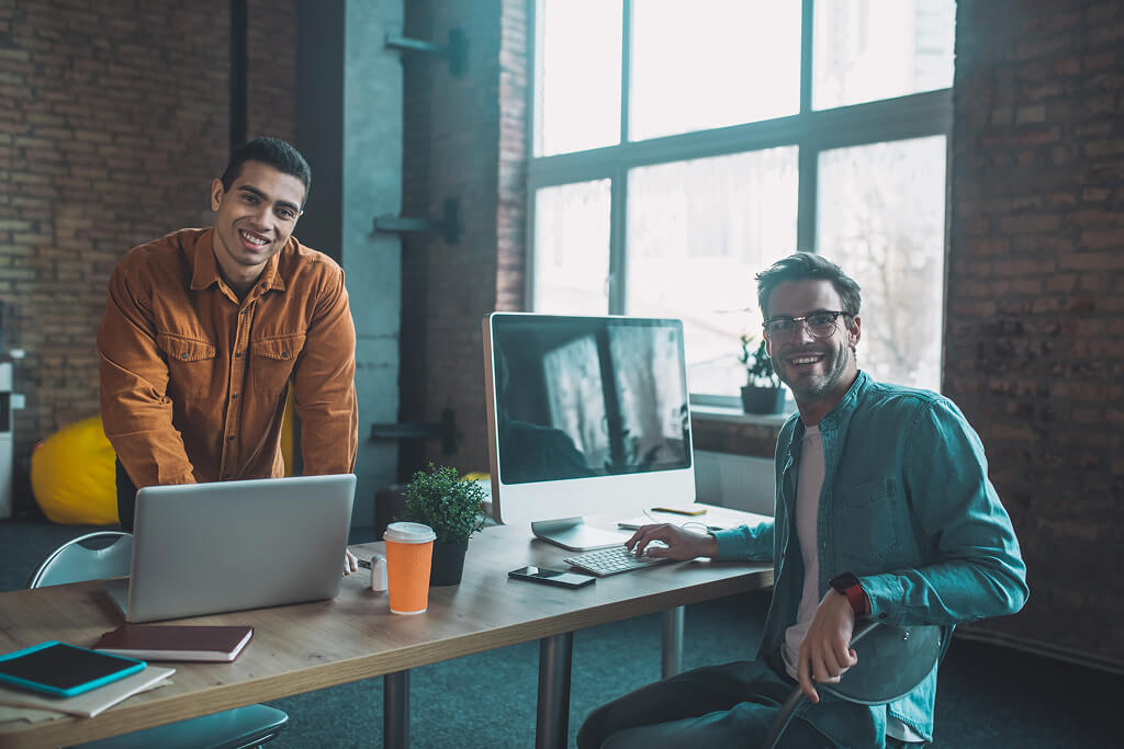 happy positive men being in a good mood at work 2024 10 17 06 42 47 utc